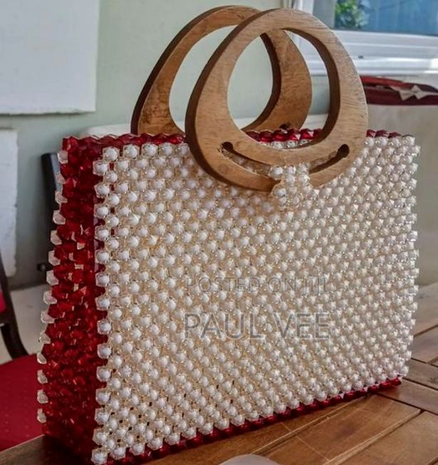 Elegant Handcrafted Red and Cream Beaded Tote Bag