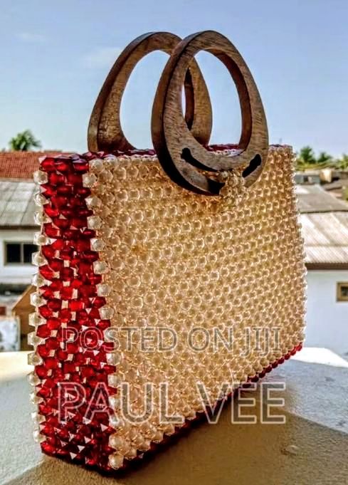 Elegant Handcrafted Red and Cream Beaded Tote Bag