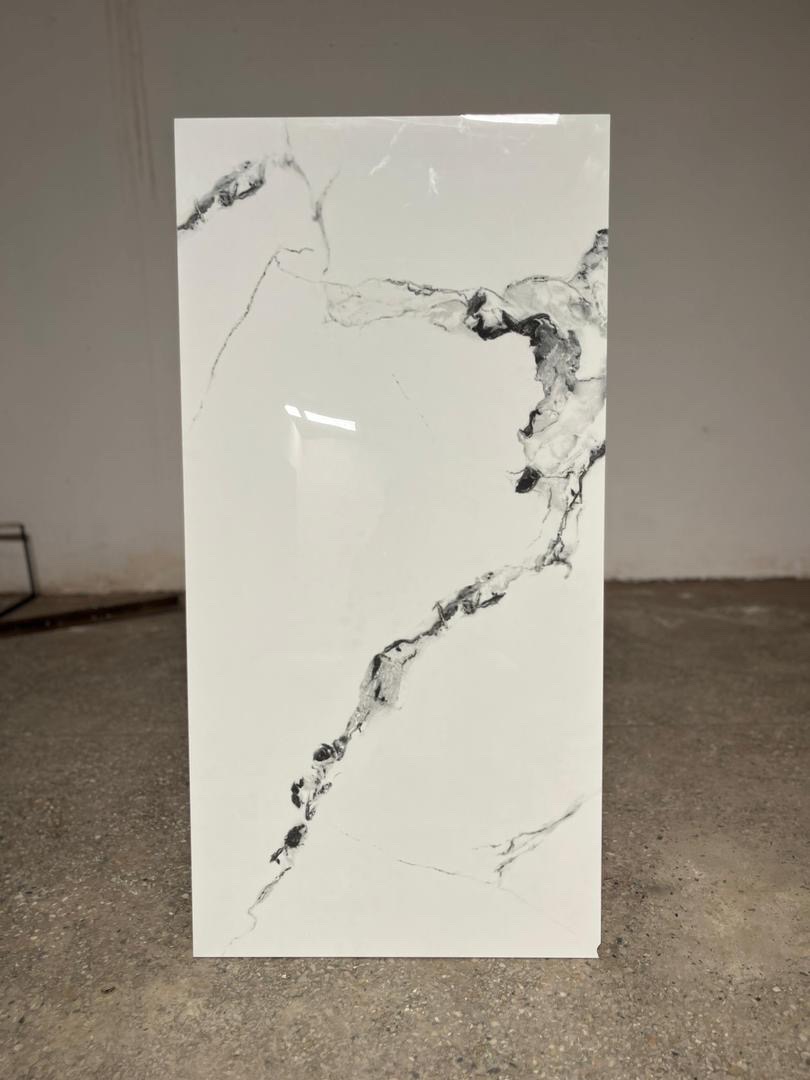 60/120cm. Made in India, 2pcs in a box. Gh300. Except pure black 60/120cm which is Gh350.1.44 square meter in a boxBoth polished and unpolished.