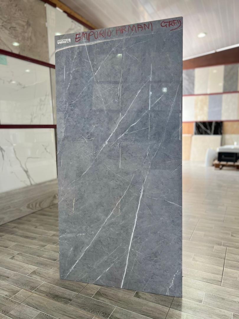 60/120cm. Made in India, 2pcs in a box. Gh300. Except pure black 60/120cm which is Gh350.1.44 square meter in a boxBoth polished and unpolished.