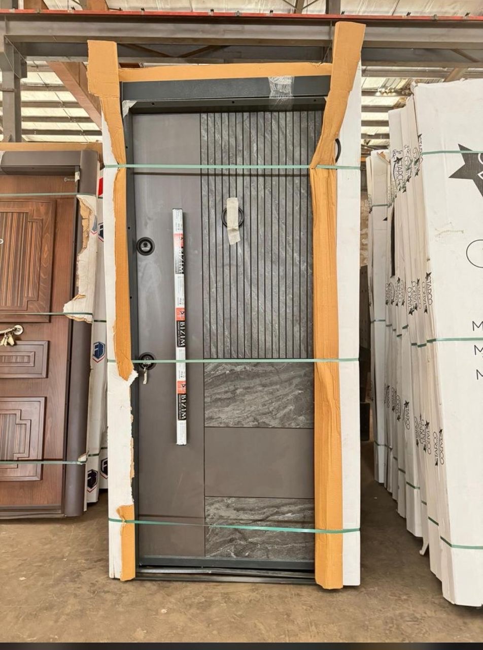 Heavy security door from Turkey. Single Gh5,500.