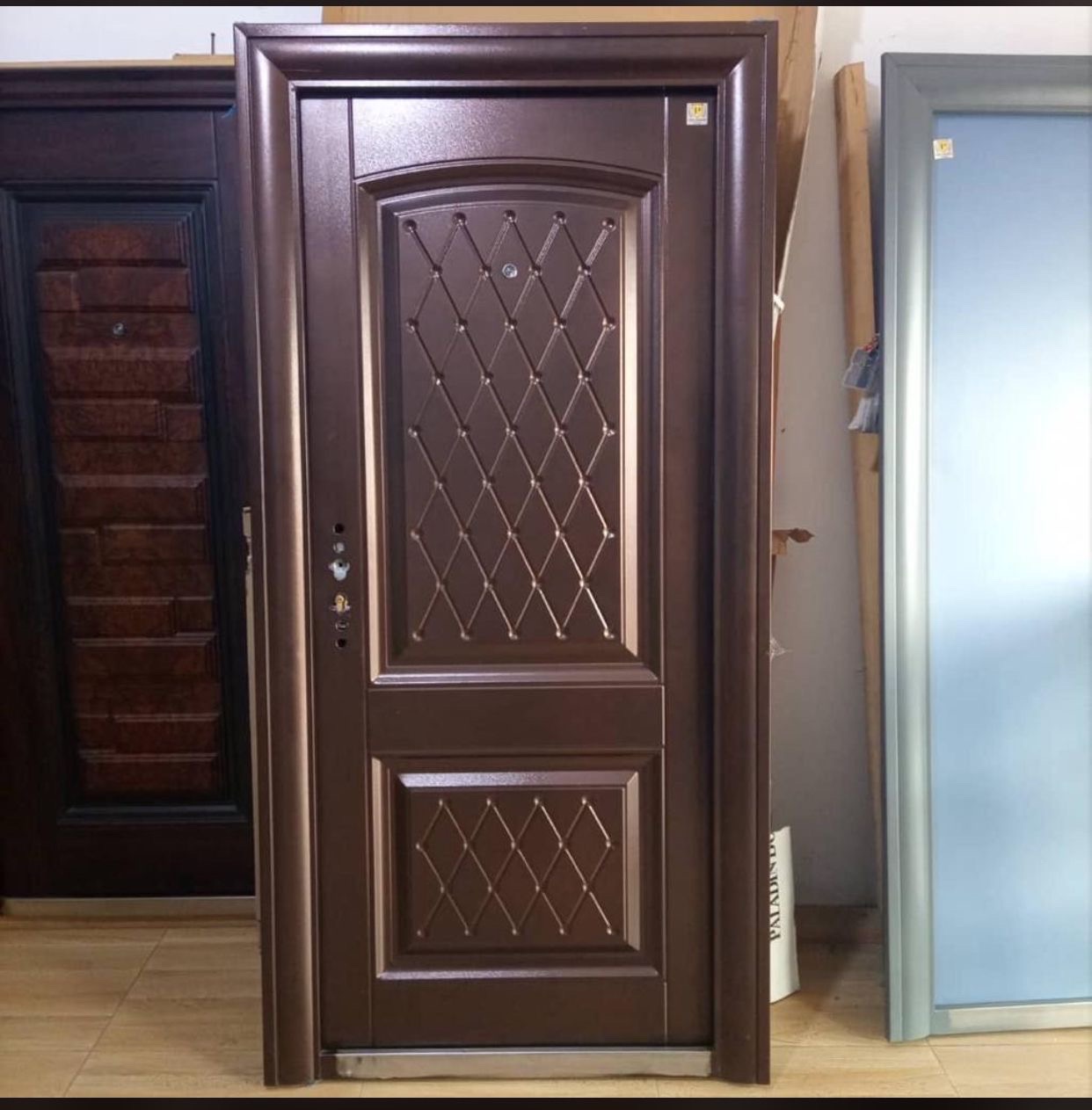 Rough surface doors from Turkey. Single Gh1,800.