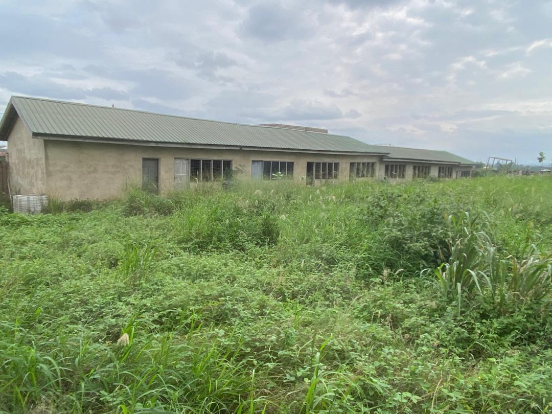 roadside 5 plots with 10 single rooms for sale @ Kotoku